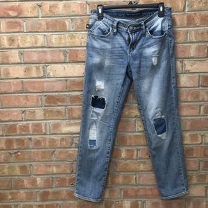 Vintage wash patch distressed boyfriend jeans